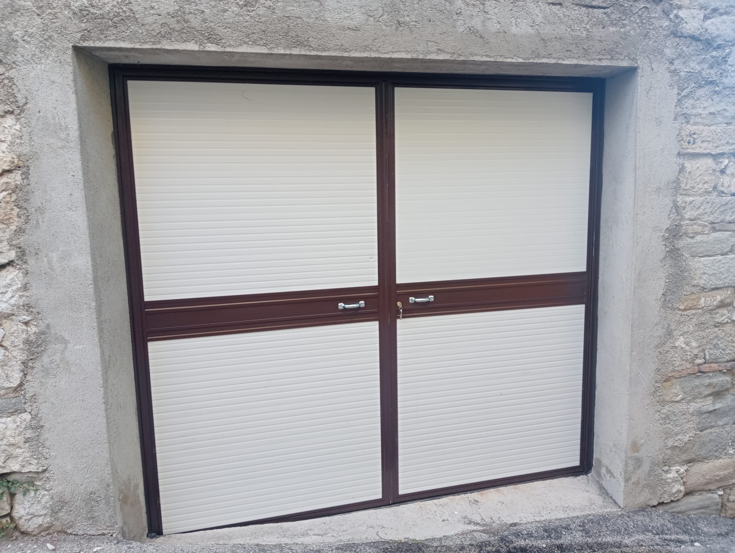 RC-49P – Realizazione porta garage per abitazione privata.